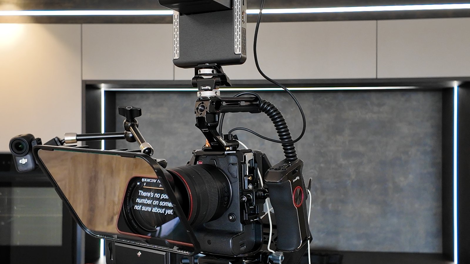 A camera, teleprompter and monitor set up for a client shoot in a kitchen showroom