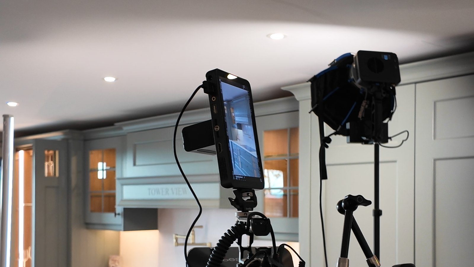 A camera, monitor and softbox light set up for a client shoot